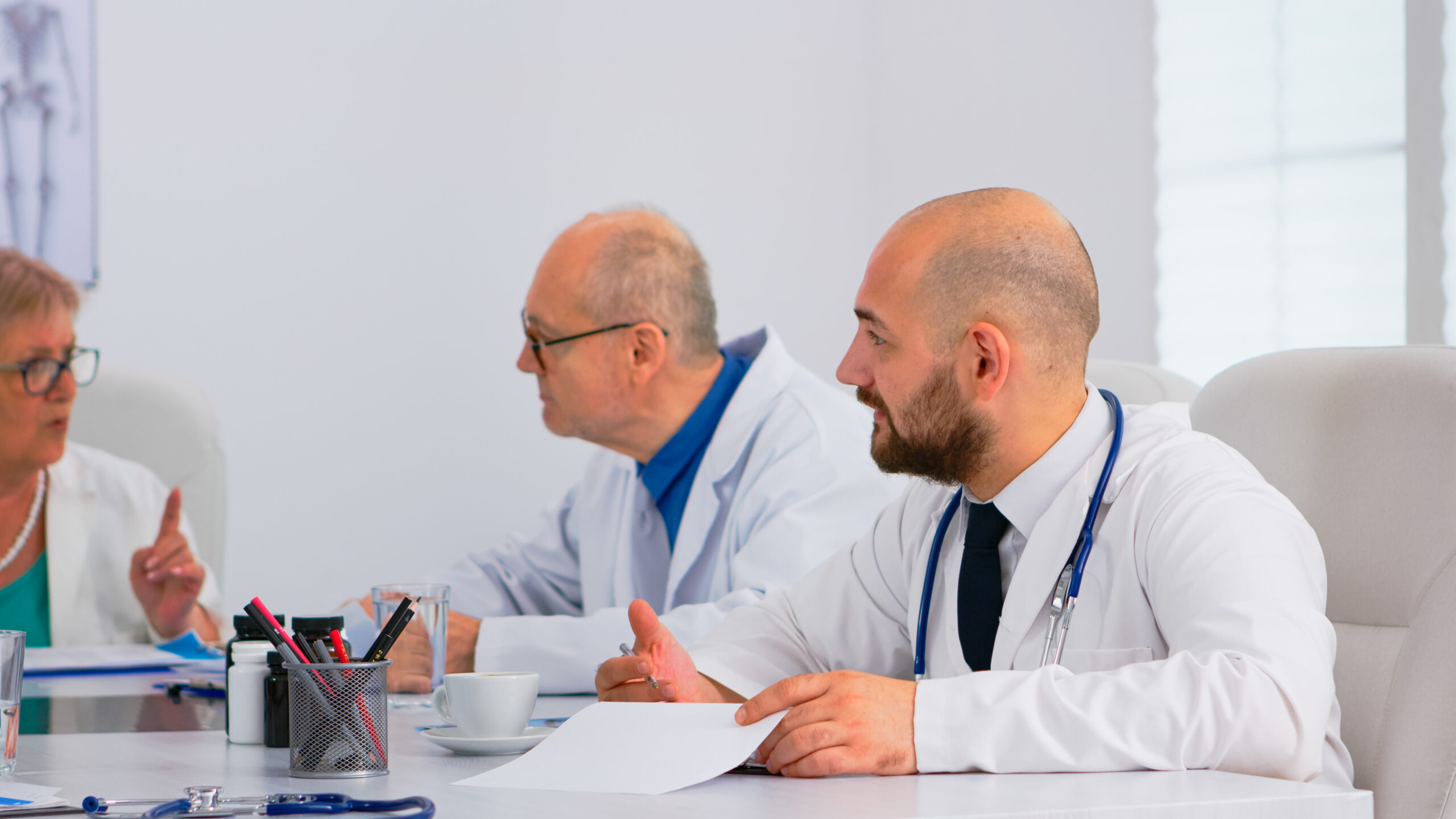 Medical experts for media in a collaborative discussion, providing consultation to ensure realistic medical accuracy in television and movie scenes.
